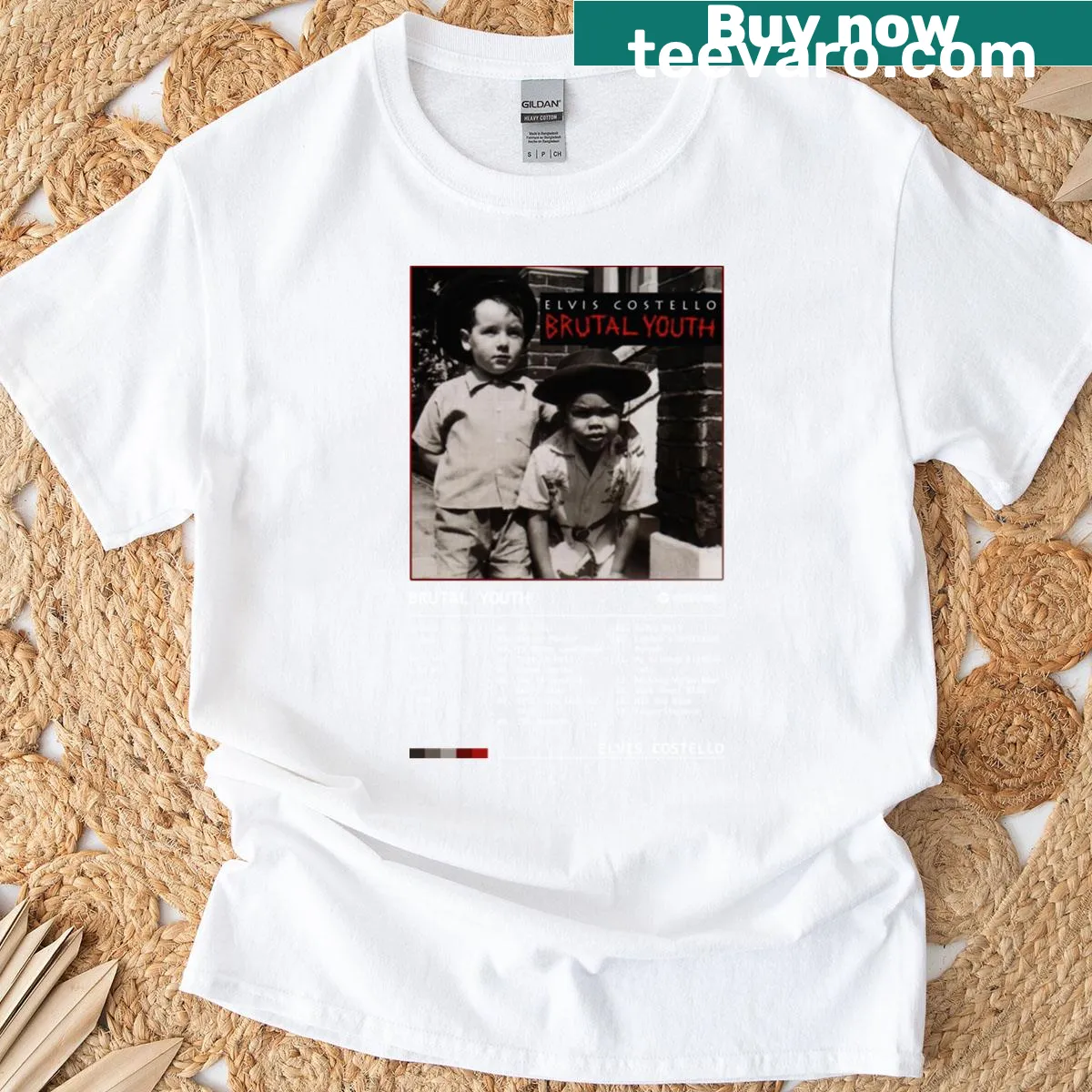 Vintage distressed T-shirt featuring Elvis Costello's 'Brutal Youth' — on a men's t-shirt