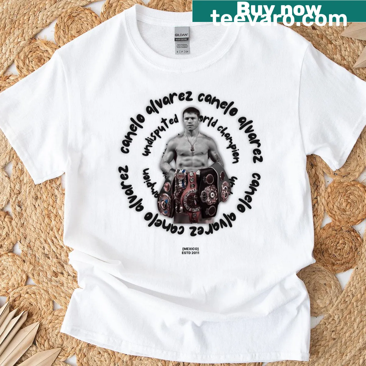 Vintage-style Canelo Alvarez shirt with champion graphic and bold text — on a men's t-shirt