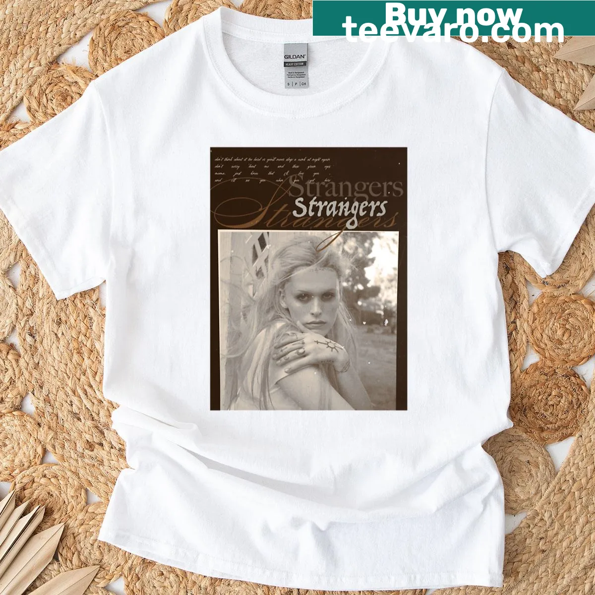 Bold typography design of Ethel Cain's song 'Strangers' on T-shirt — on a men's t-shirt
