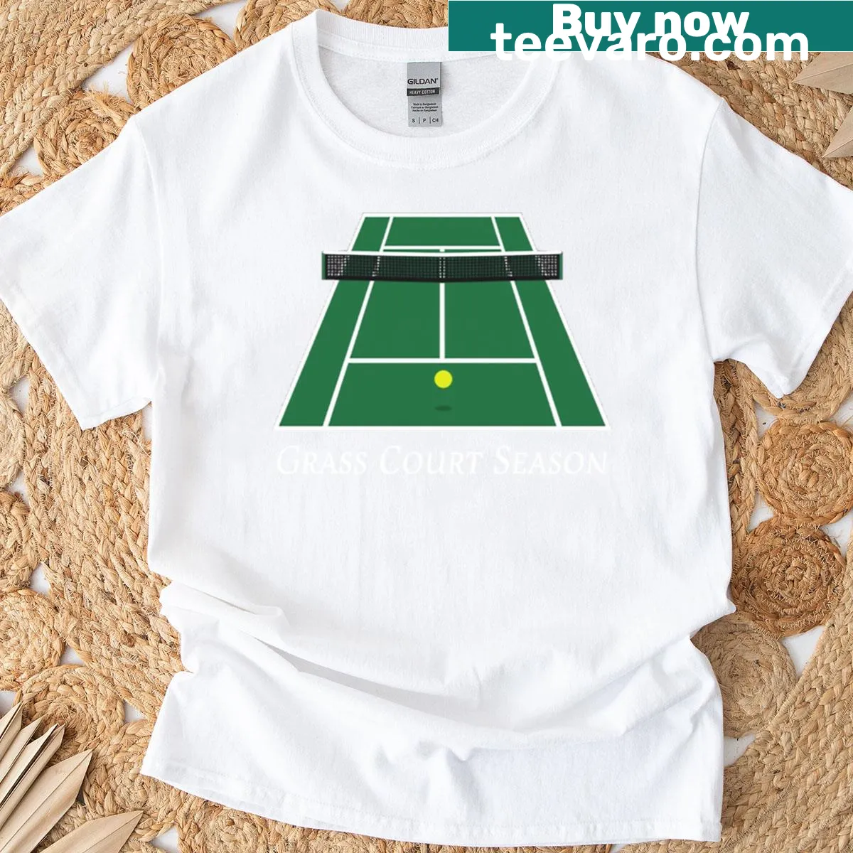 Minimalist tennis-themed T-shirt showcasing grass court season design — on a men's t-shirt