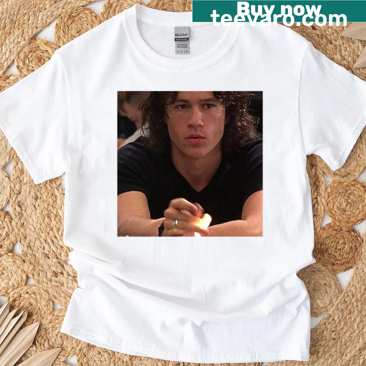 Artistic T-shirt honoring Heath Ledger with iconic imagery — on a men's t-shirt