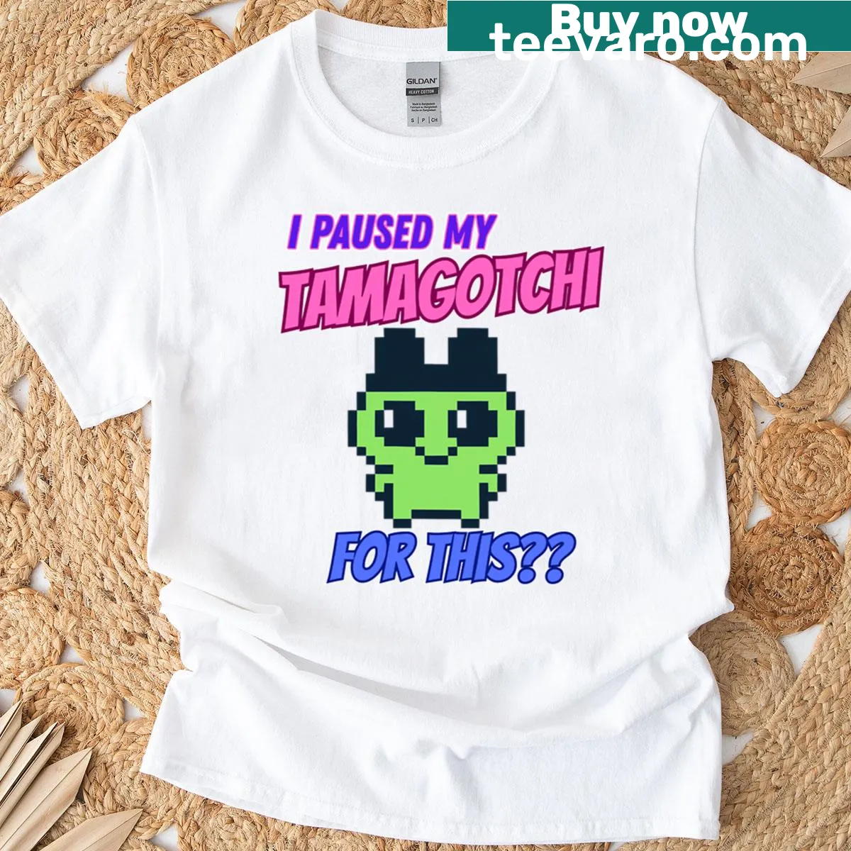 Funny retro T-shirt featuring a pixelated Tamagotchi design. — on a men's t-shirt