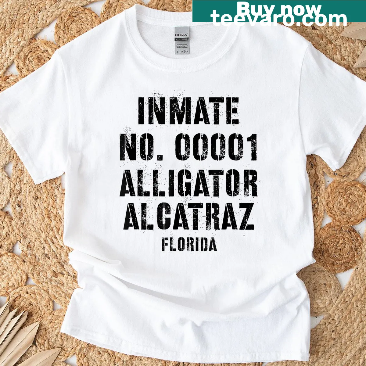 Illustrated t-shirt featuring inmate no 00001 and an alligator design — on a men's t-shirt