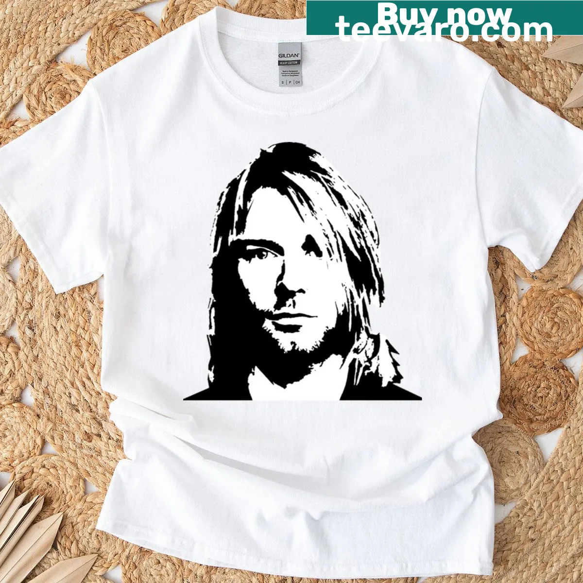 Graphic T-shirt honoring Kurt Cobain, featuring iconic imagery — on a men's t-shirt