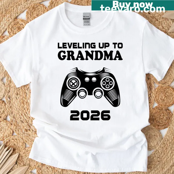 Vintage-style T-shirt announcing Leveling Up To Grandma 2026