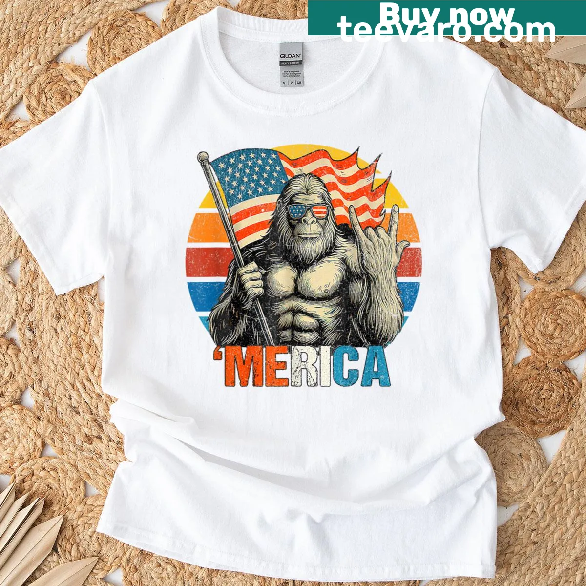 Cartoon Bigfoot with American flag graphic for July 4th celebrations. — on a men's t-shirt
