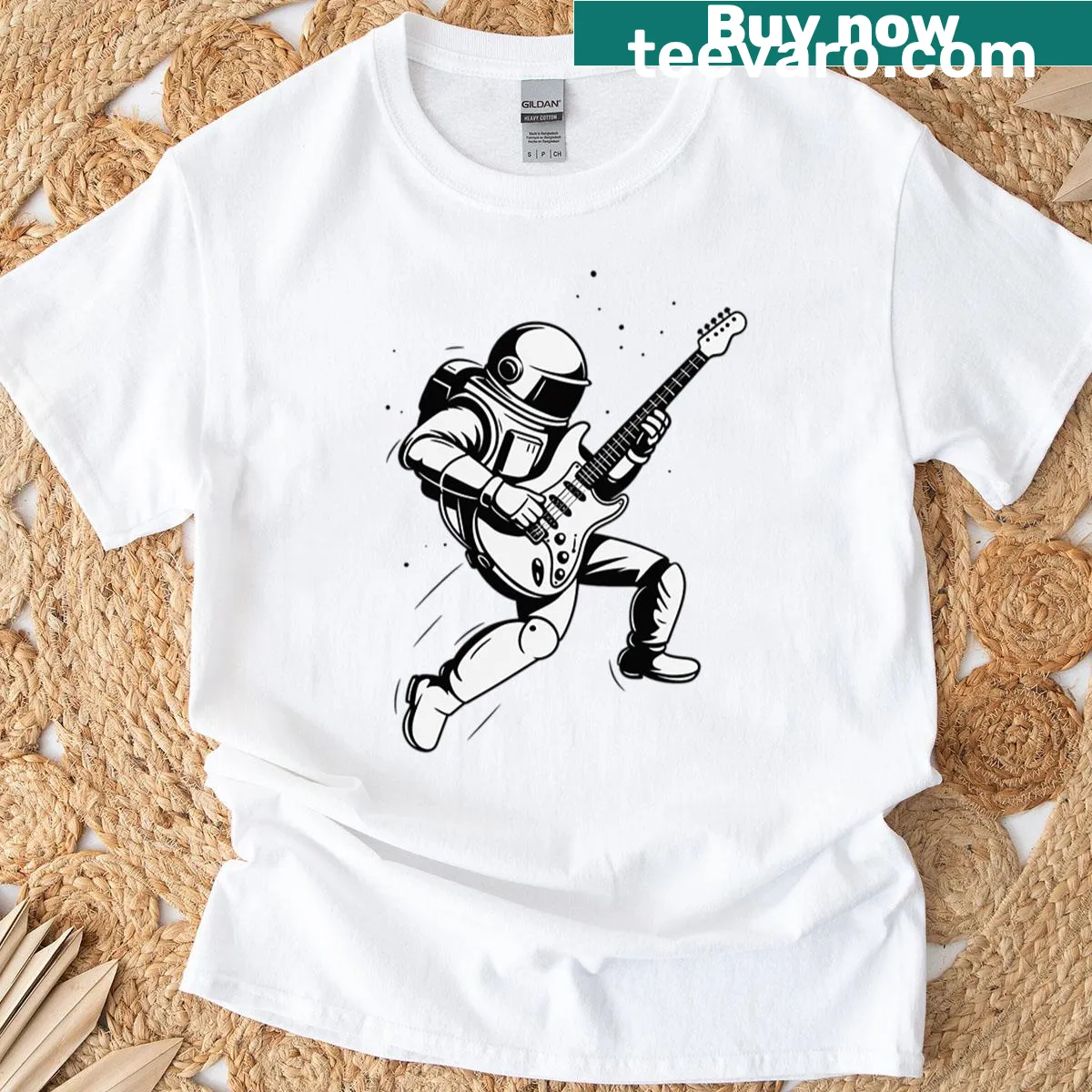 Whimsical astronaut playing electric guitar graphic T-shirt — on a men's t-shirt