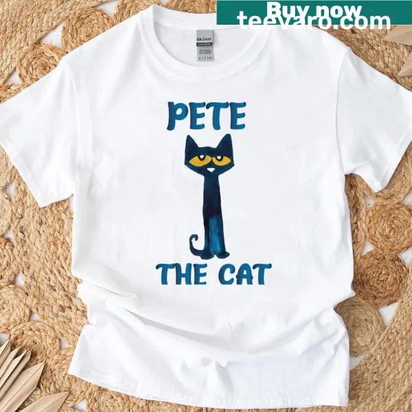 Vintage logo T-shirt with a cartoon cat, books, and movie themes.