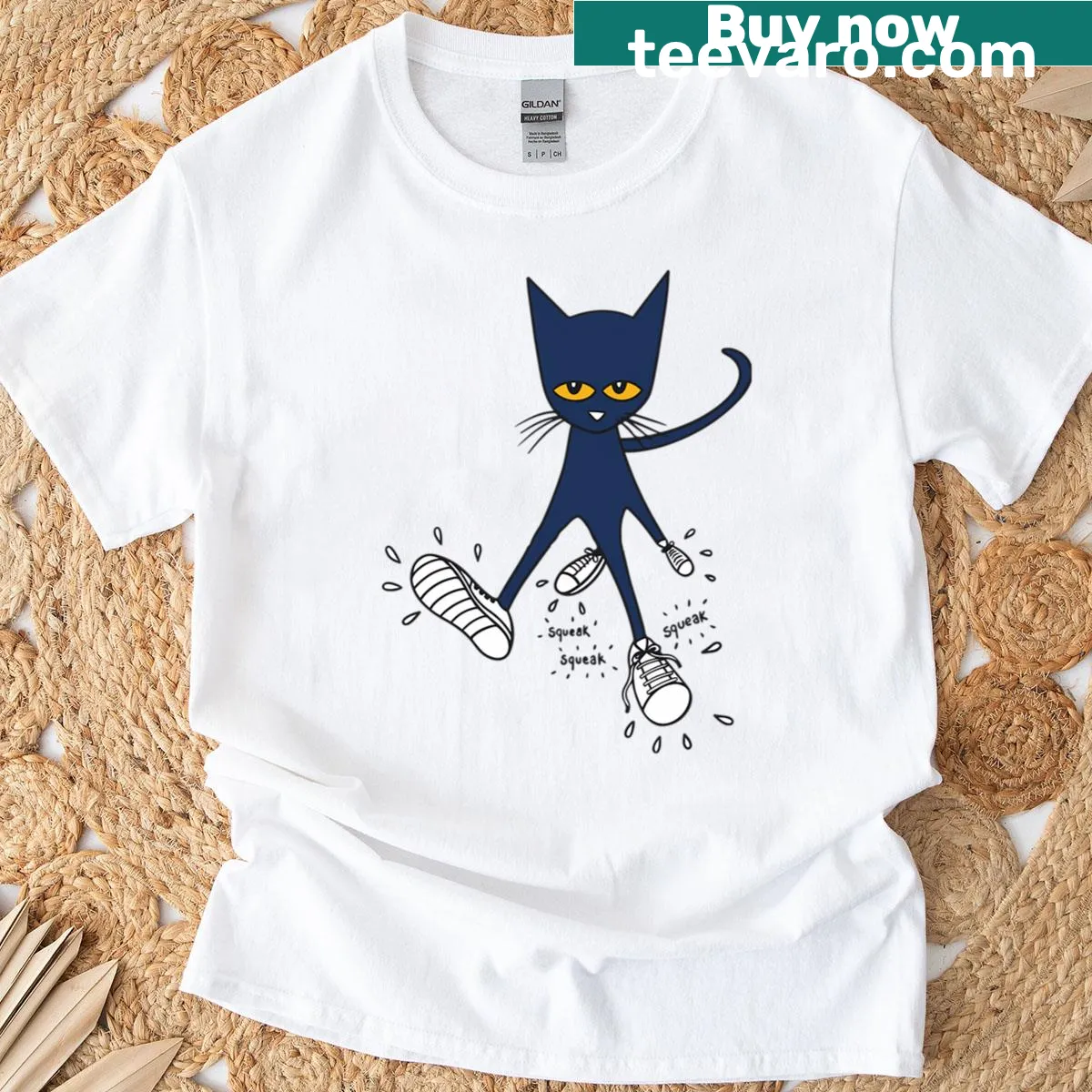 Cartoon t-shirt featuring shoes, books, cats, and movies — on a men's t-shirt