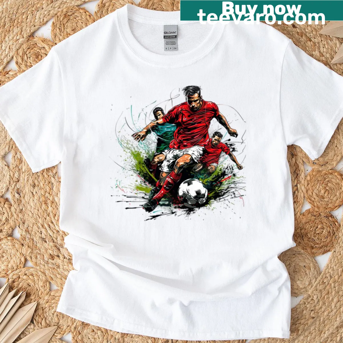 Graphic t-shirt featuring a soccer player in action — on a men's t-shirt