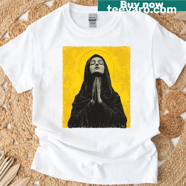 Illustrated T-shirt featuring the Virgin Mary in a serene design.