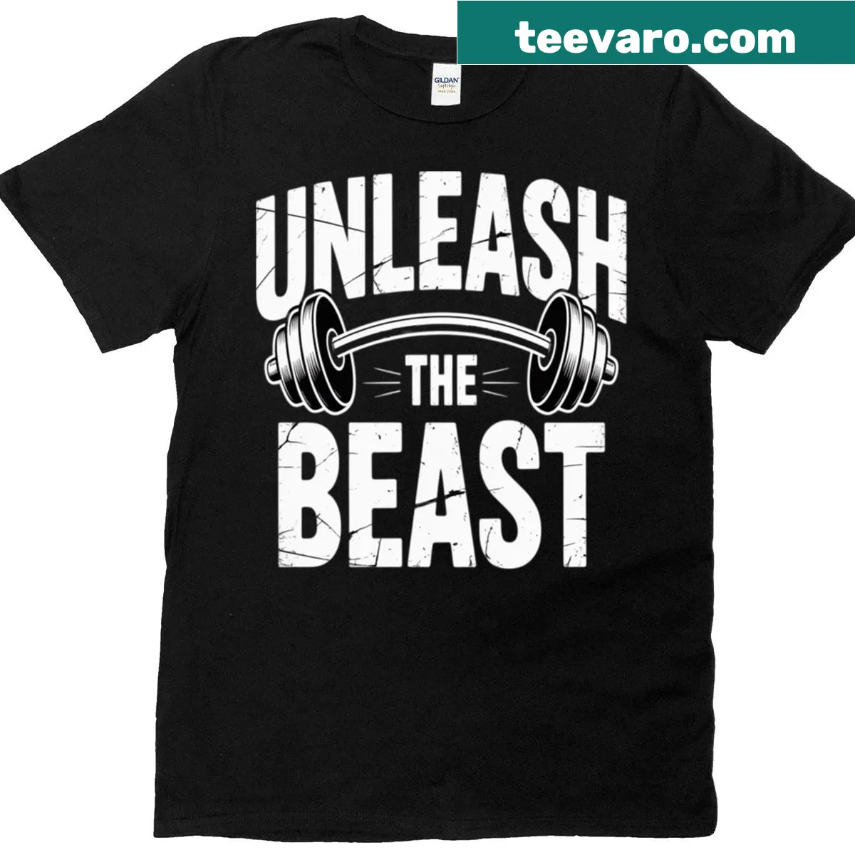 Bold graphic t-shirt featuring barbell and 'Unleash The Beast' text — on a men's t-shirt