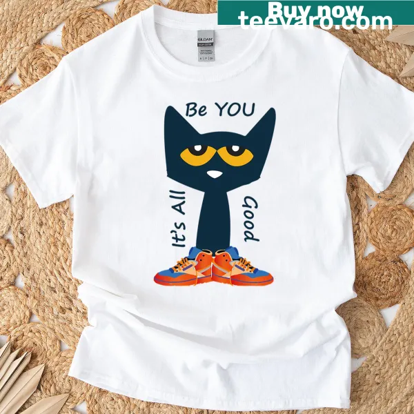 Cartoon cat logo with shoes and books on a vintage-styled t-shirt