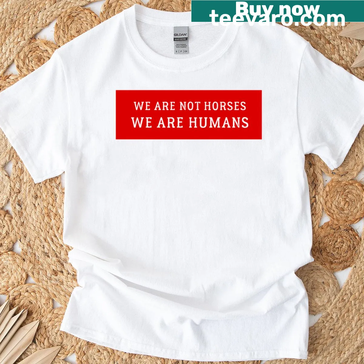 Witty text shirt saying 'We Are Not Horses We Are Humans'. — on a men's t-shirt