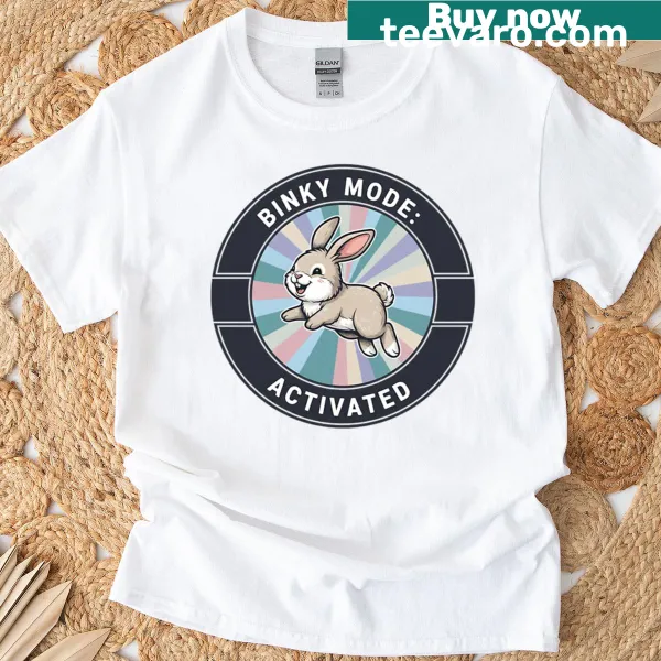 Cute t-shirt with a jumping rabbit design expressing 'Binky Mode Activated.'