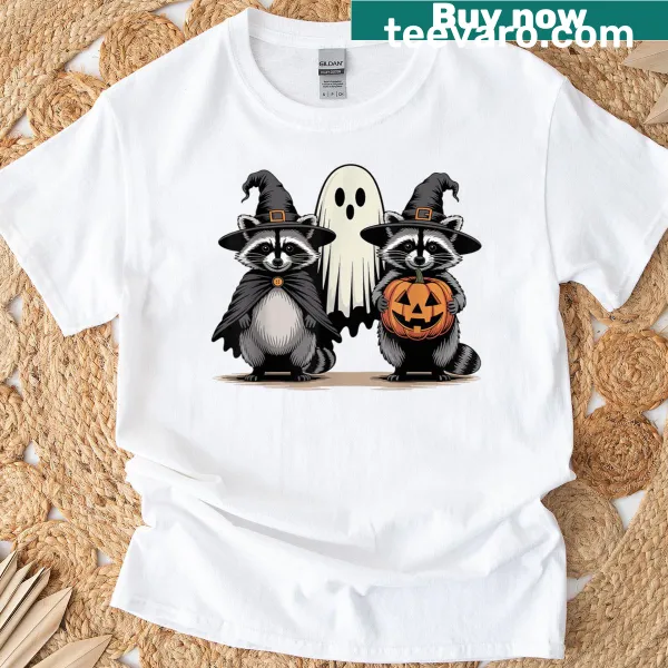 Cartoon Halloween tee with ghost raccoon, pumpkin, and witch