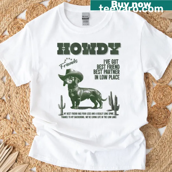 Retro-style t-shirt with a dachshund cowboy and 'Howdy' text