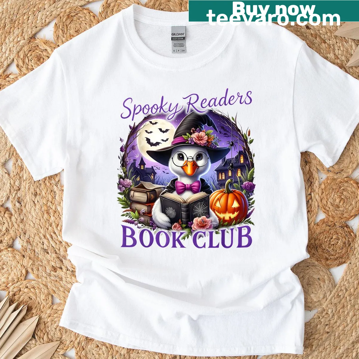 Whimsical Halloween t-shirt with a witchy goose and book club theme — on a men's t-shirt