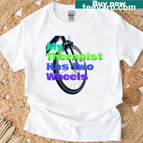 T-shirt with the phrase 'My Therapist Has Two Wheels' in fun typography