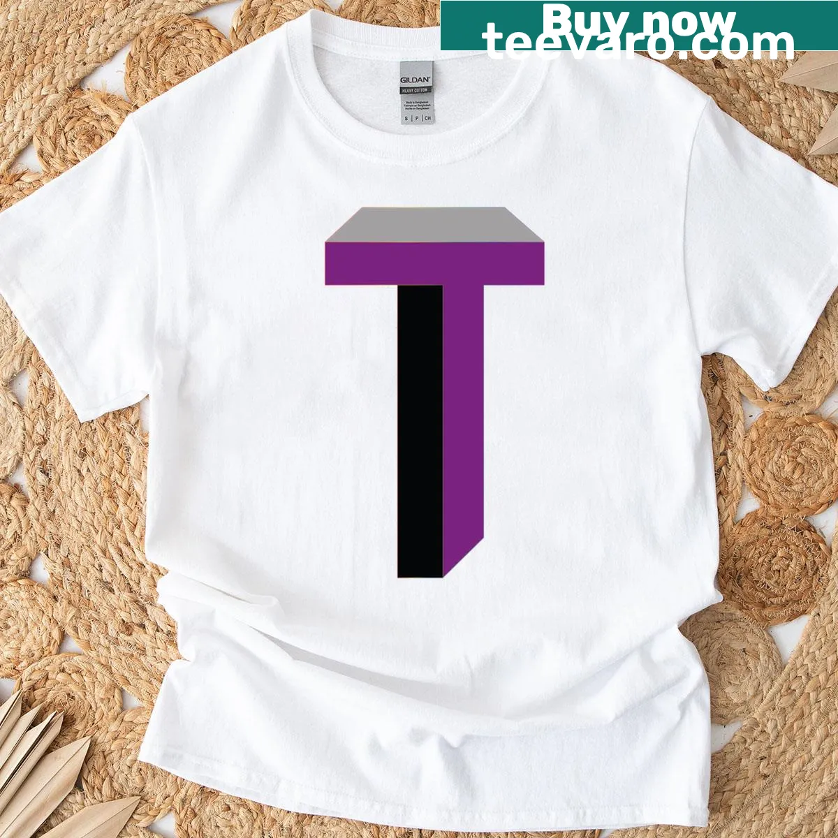 Minimalist T-shirt featuring a simple letter 'T' graphic — on a men's t-shirt