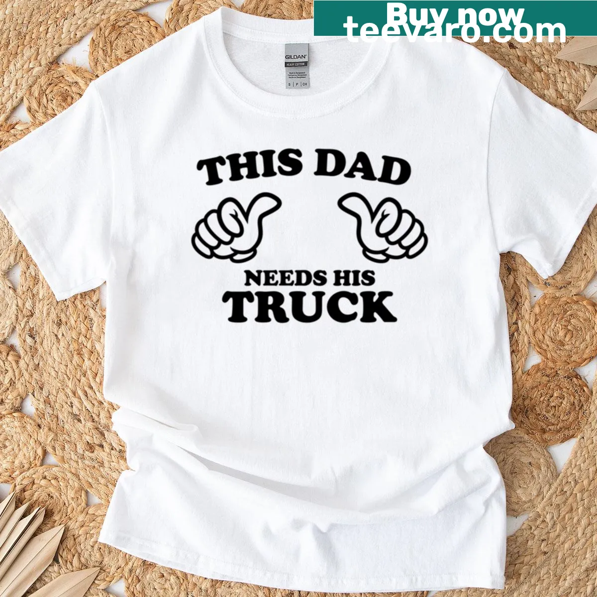 T-shirt featuring the phrase 'This Dad Needs His Truck' in bold text — on a men's t-shirt