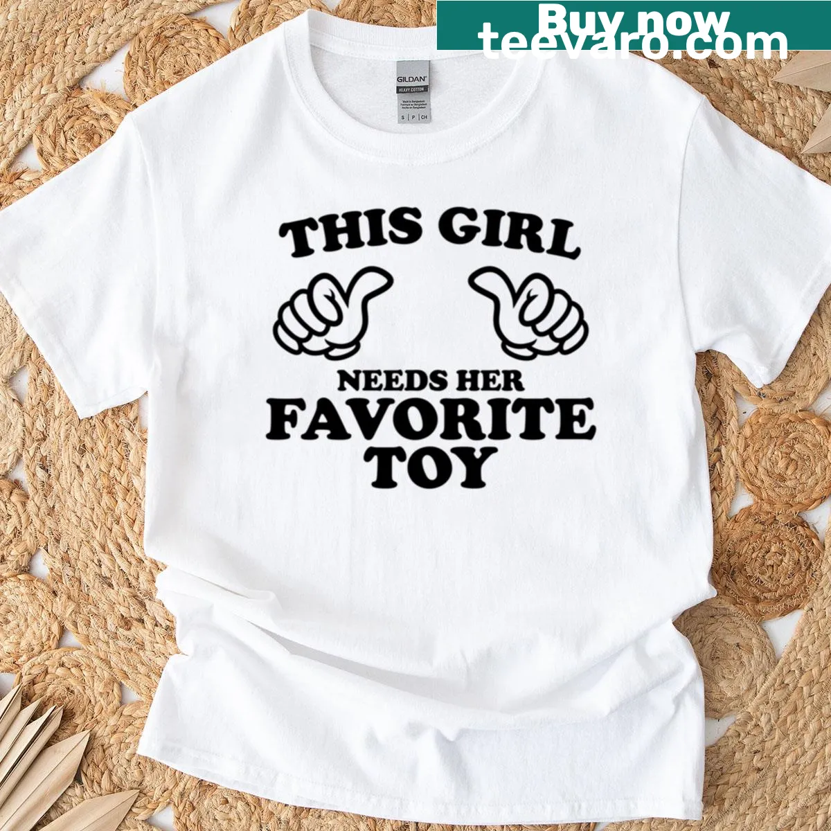 Cute T-shirt with the phrase 'This Girl Needs Her Favorite Toy' — on a men's t-shirt