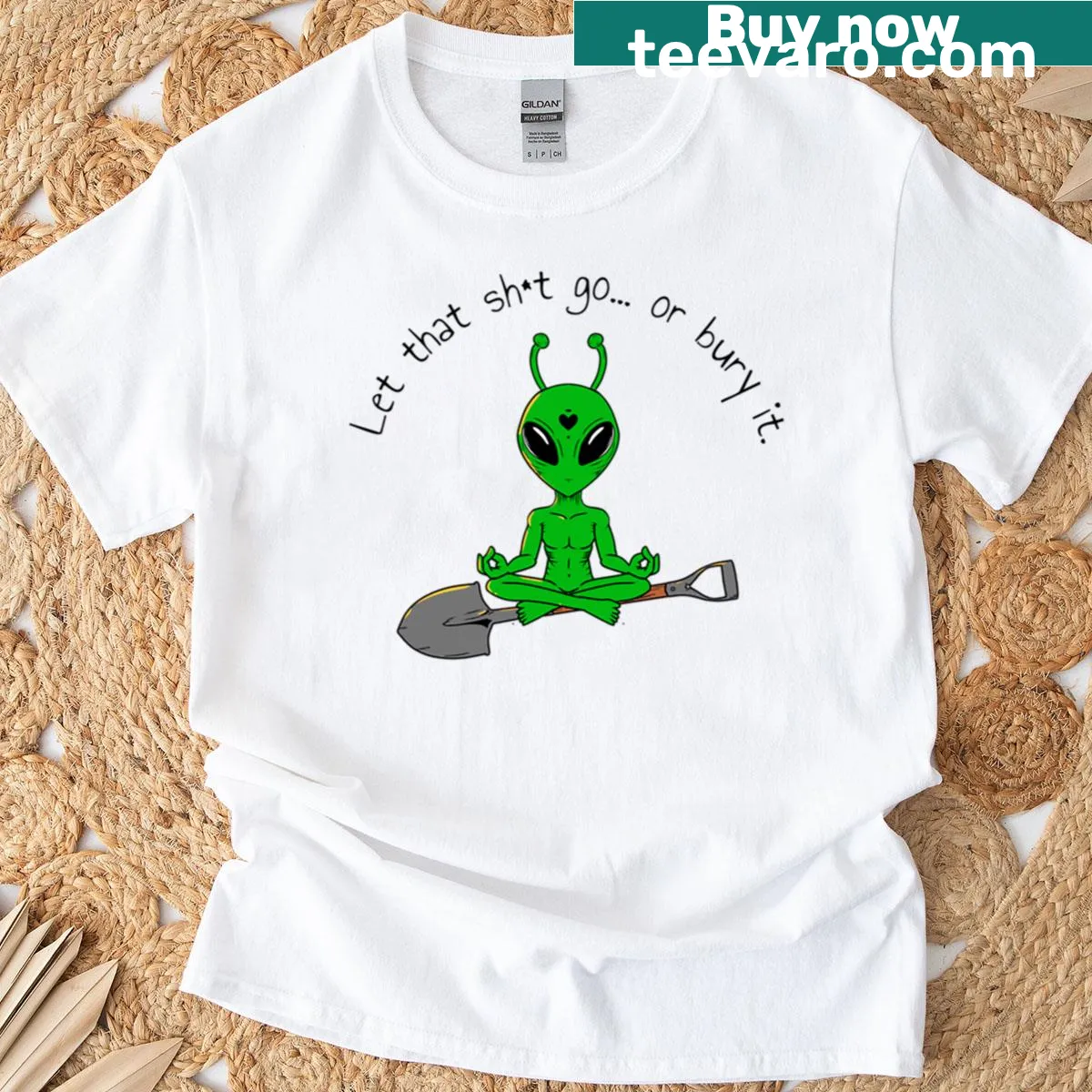 Charming alien illustration with 'We Come In Shovels' text on T-shirt — on a men's t-shirt
