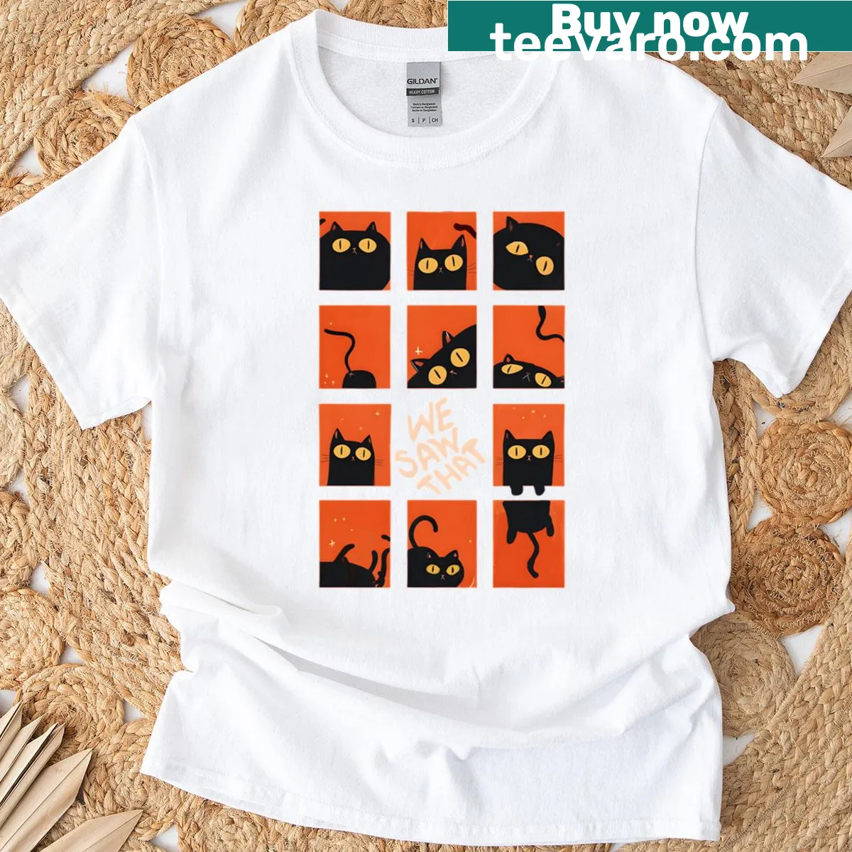 Grid of silly black cats illustrated on a T-shirt — on a men's t-shirt
