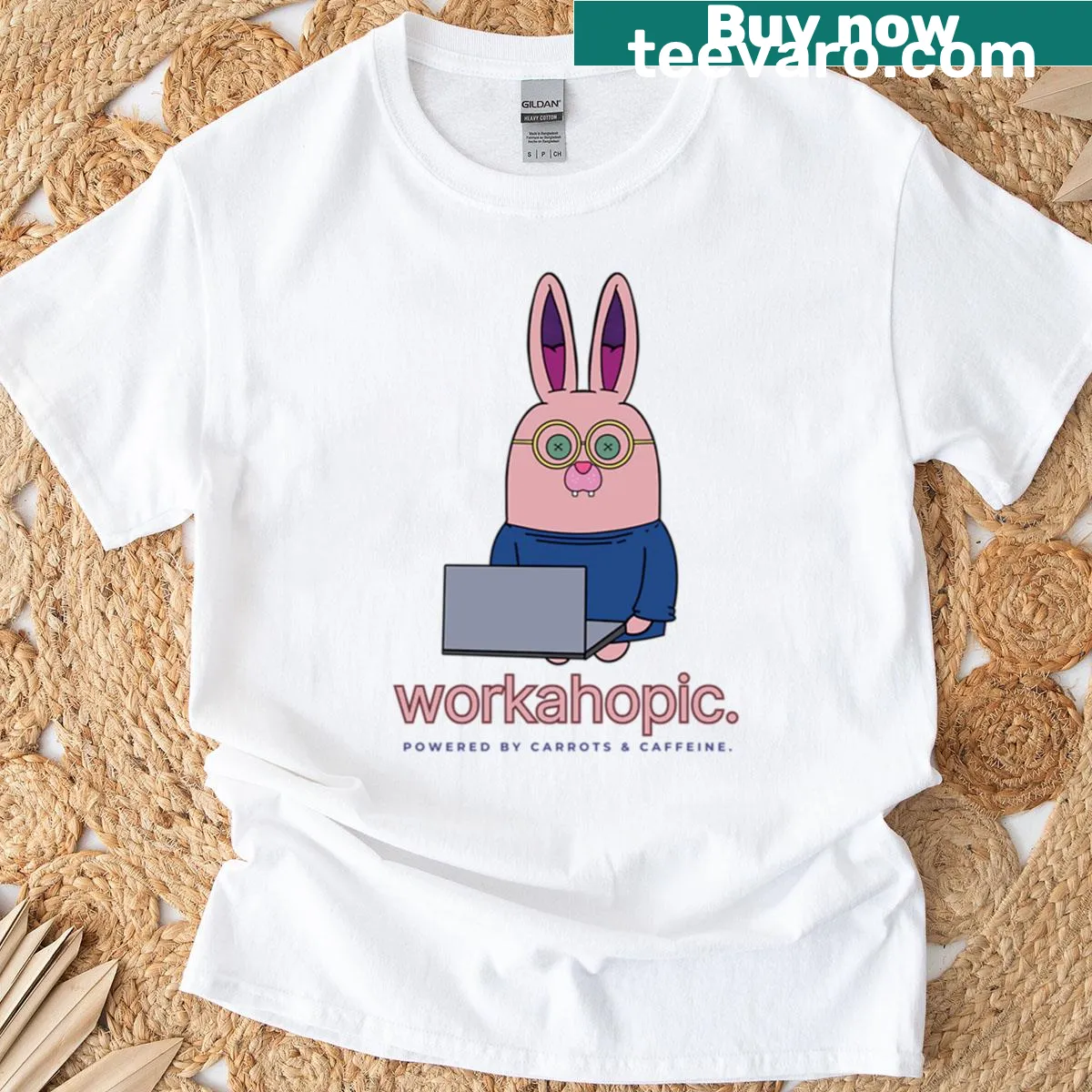 Illustration of a bunny typing on a laptop for work-themed T-shirt — on a men's t-shirt