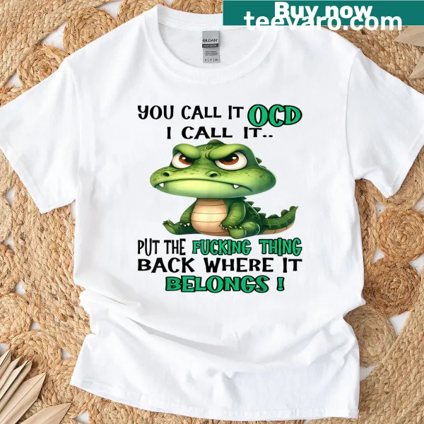 Cute crocodile graphic with humorous text about OCD on t-shirt