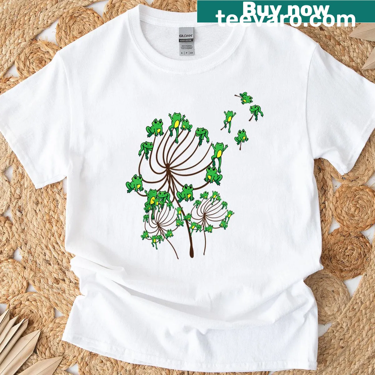 Cute T-shirt featuring a frog and dandelions illustration — on a men's t-shirt