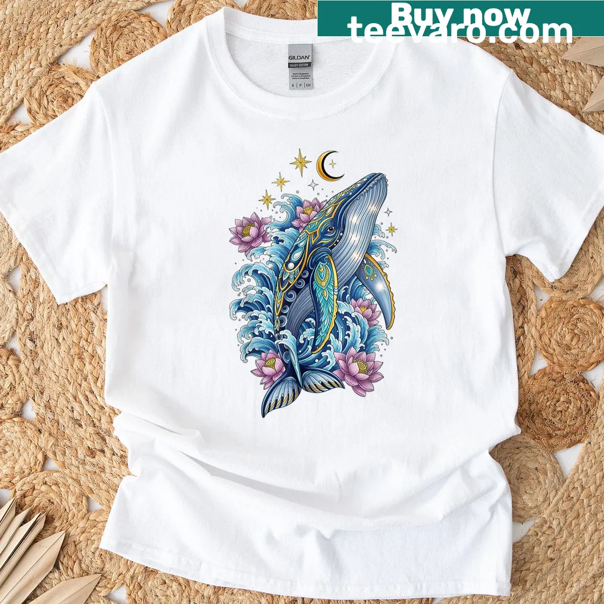 T-shirt featuring a humpback whale, lotus flowers, and celestial motifs — on a men's t-shirt