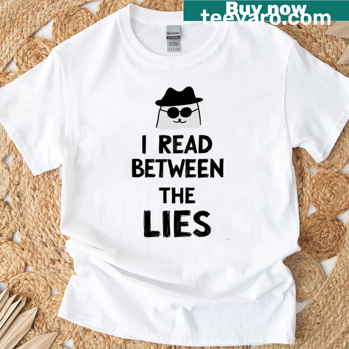 T-shirt with the quote 'I Read Between The Lies' for mystery book lovers — on a men's t-shirt