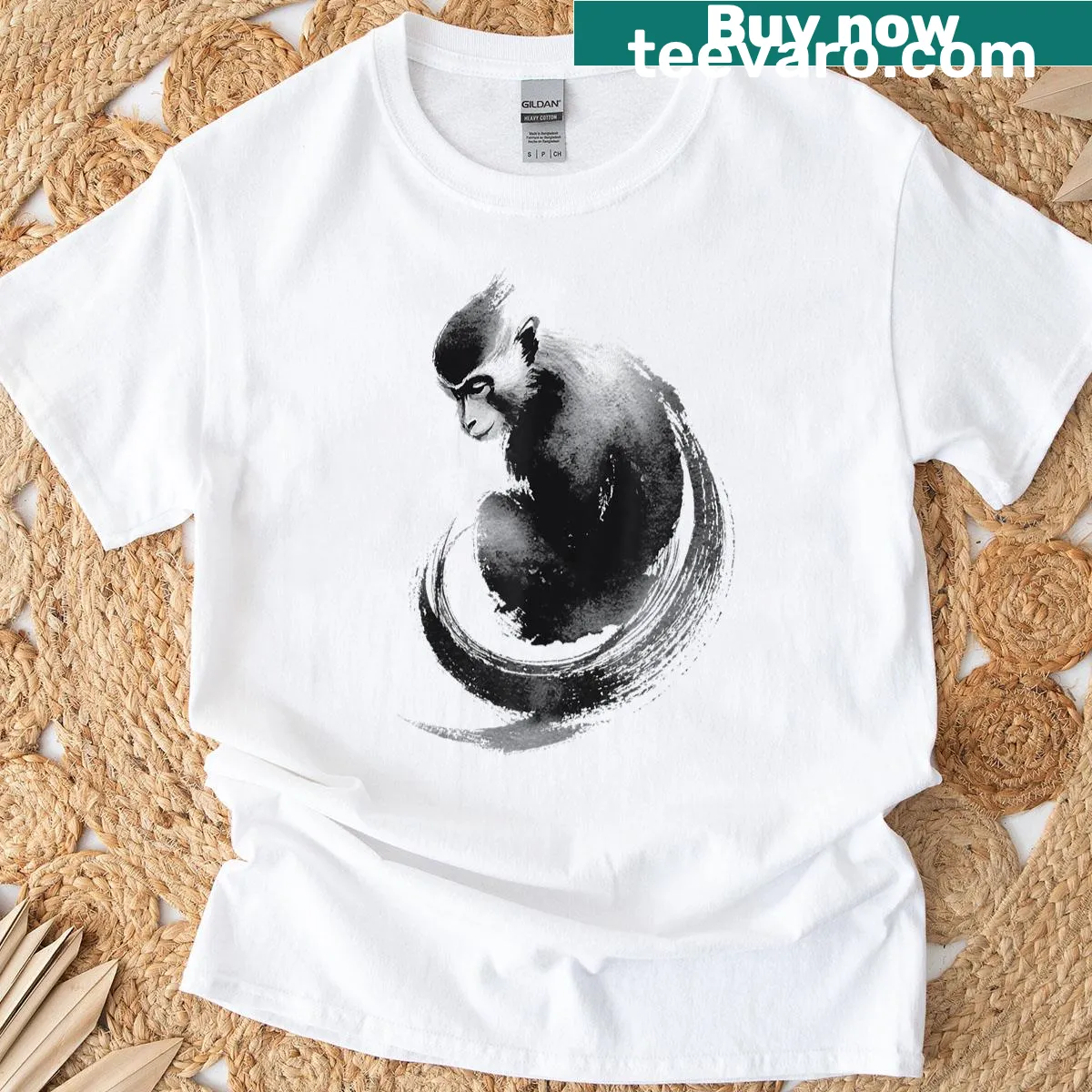 Minimalist silhouette T-shirt featuring a Sumi-e monkey design — on a men's t-shirt