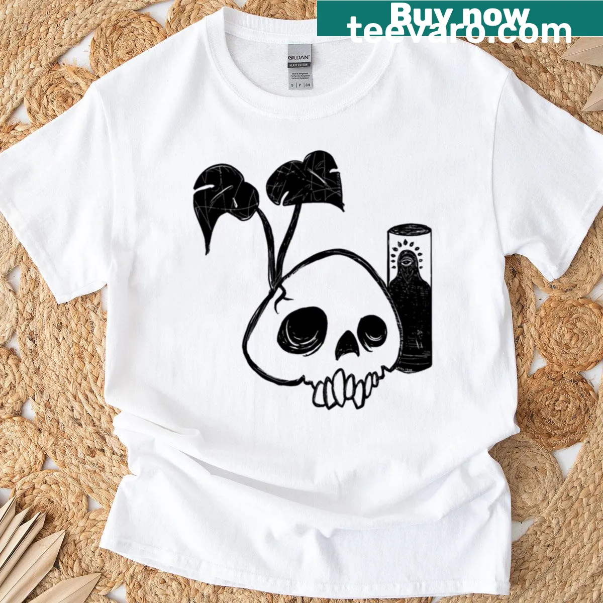 T-shirt featuring a monstera leaf design combined with a skull — on a men's t-shirt