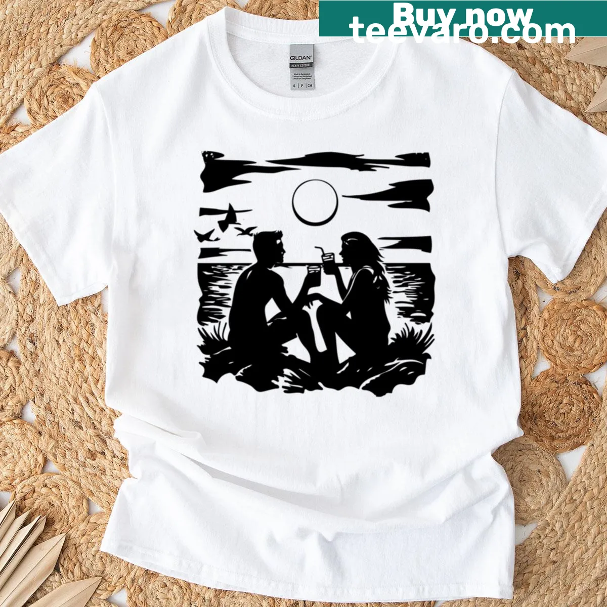 Silhouette art t-shirt of a couple on the beach at sunset — on a men's t-shirt