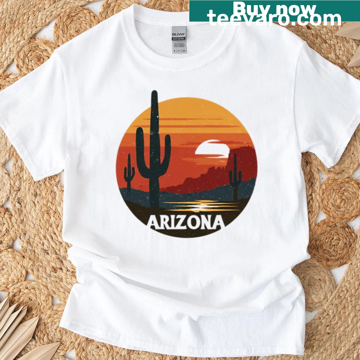 Illustrated T-shirt depicting an Arizona desert sunset with cacti and river — on a men's t-shirt