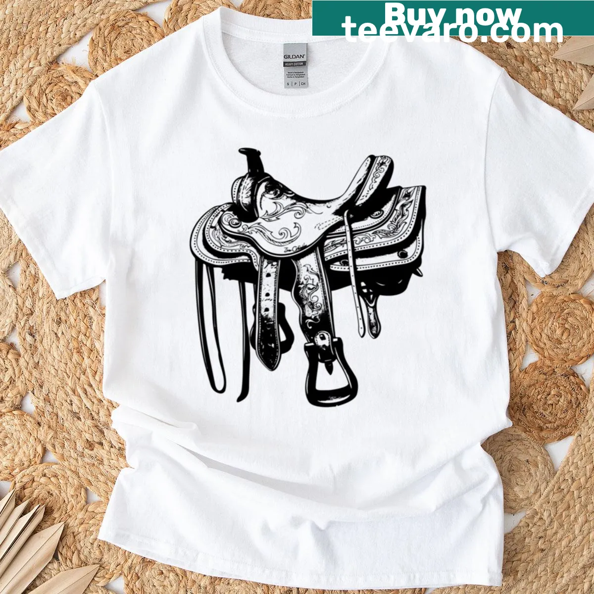 Vintage cowboy saddle illustration on a rustic-themed t-shirt — on a men's t-shirt
