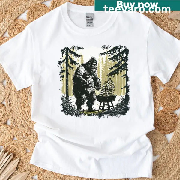 Illustration of Bigfoot grilling in woods on T-shirt