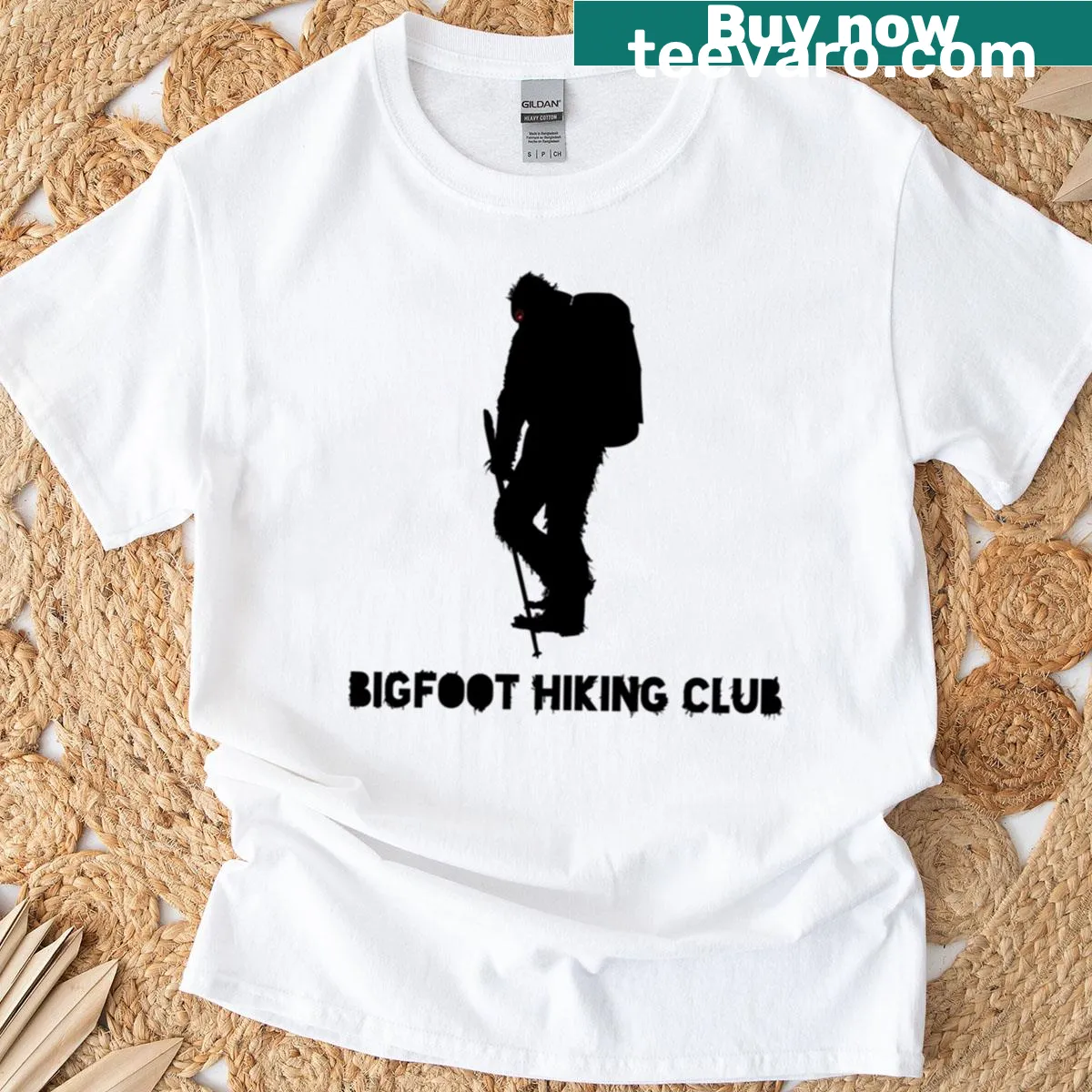Bigfoot Hiking Club t-shirt with playful graphic — on a men's t-shirt
