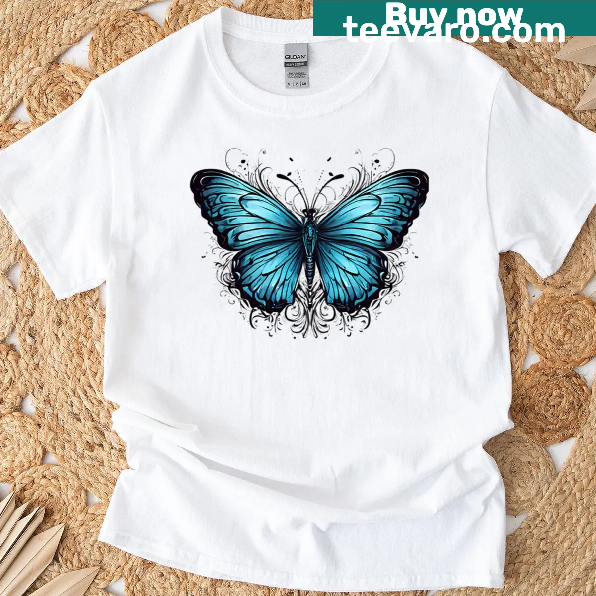 Elegant butterfly ink design t-shirt featuring a blue monarch butterfly. — on a men's t-shirt