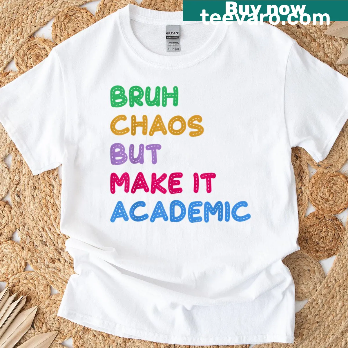 Funny teacher shirt with academic chaos slogan in bold typography — on a men's t-shirt