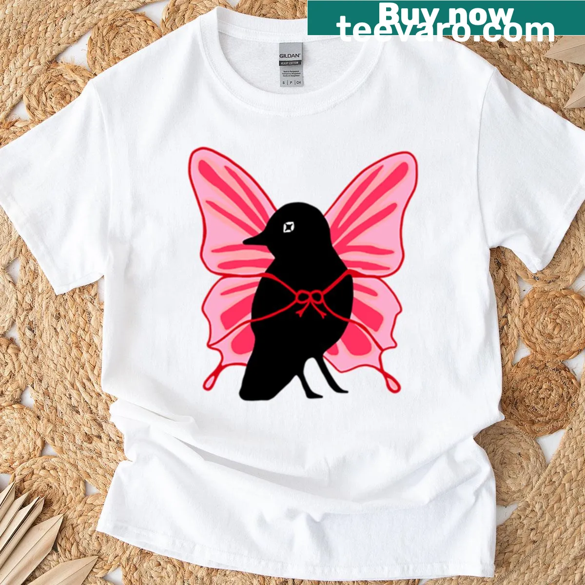 T-shirt featuring illustration of a crow with butterfly wings — on a men's t-shirt