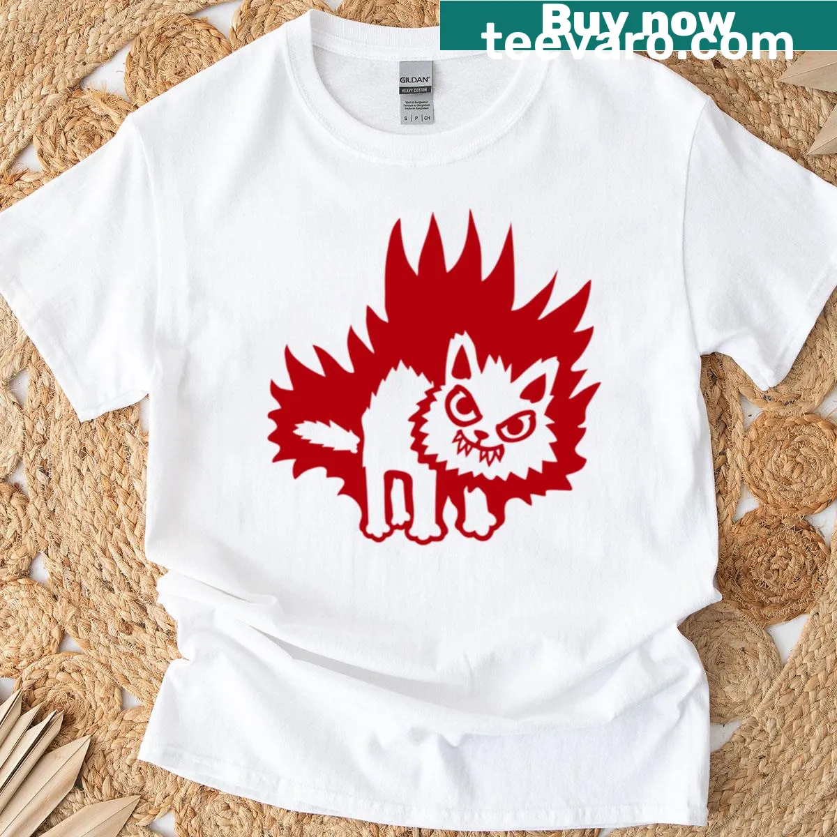 Angry cat with raised fur and flames design on T-shirt — on a men's t-shirt