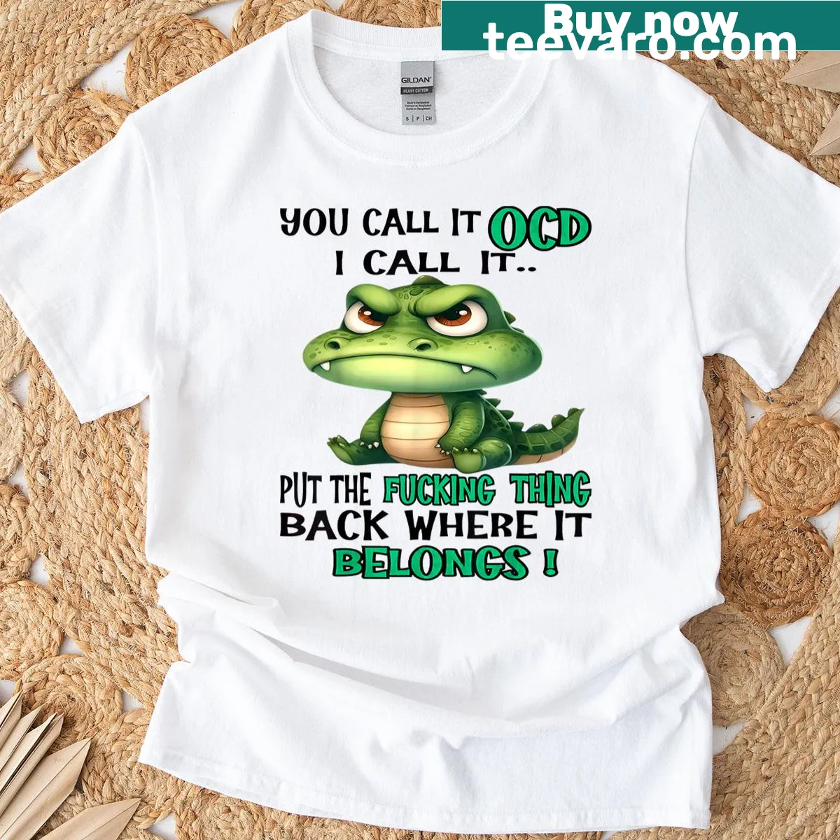 Cartoon crocodile with funny text about OCD on a t-shirt — on a men's t-shirt