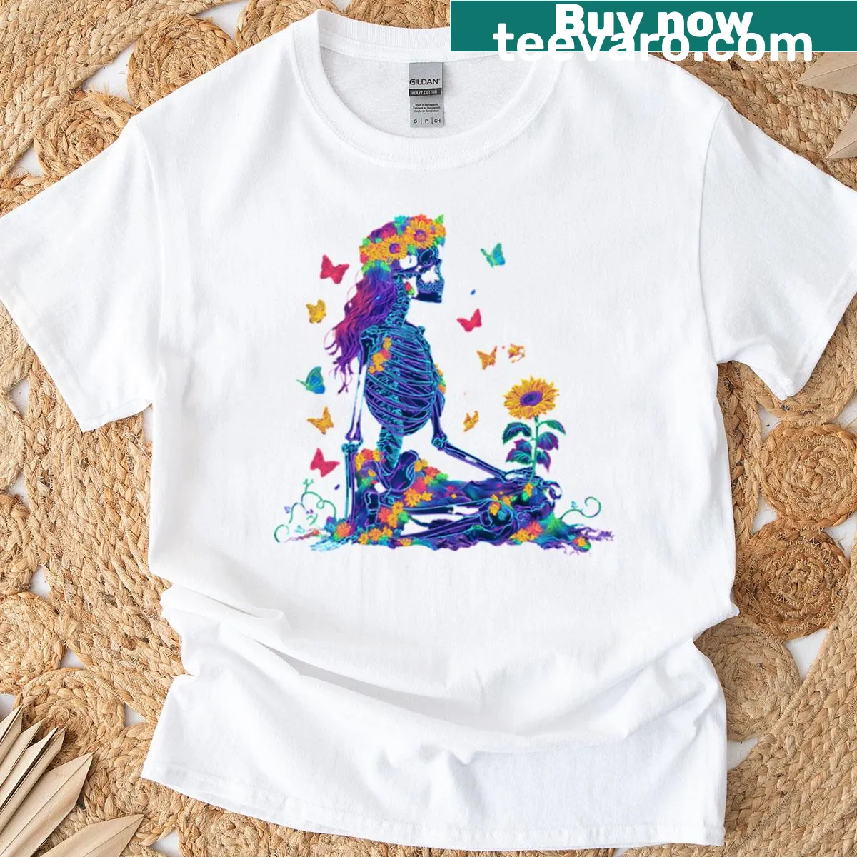 Artistic T-shirt featuring a meditating skeleton with sunflowers — on a men's t-shirt