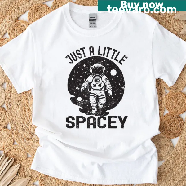 Graphic t-shirt with an astronaut and humorous space-themed puns.