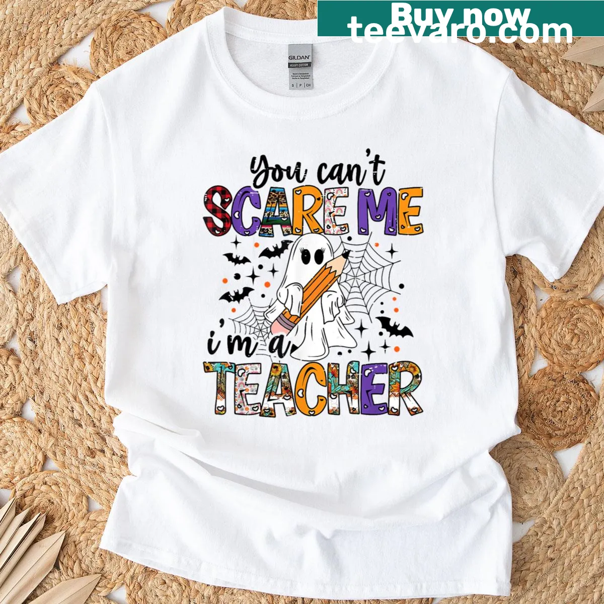 Cartoon ghost Halloween t-shirt with the phrase 'You Can't Scare Me, I'm a Teacher' — on a men's t-shirt