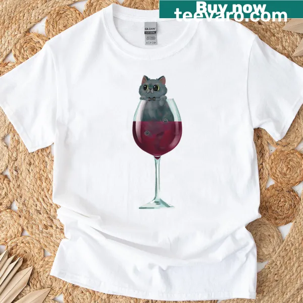 Illustration of a grey cat sitting inside a wine glass on a T-shirt.