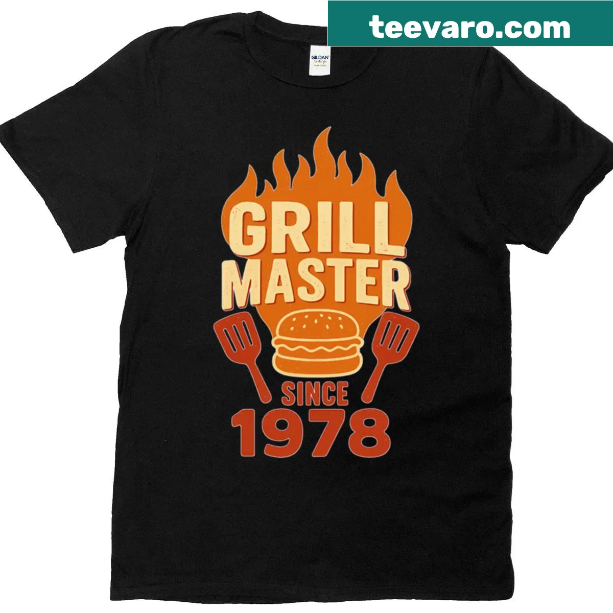 Retro BBQ Grill Master T-shirt with spatula and flames design — on a men's t-shirt